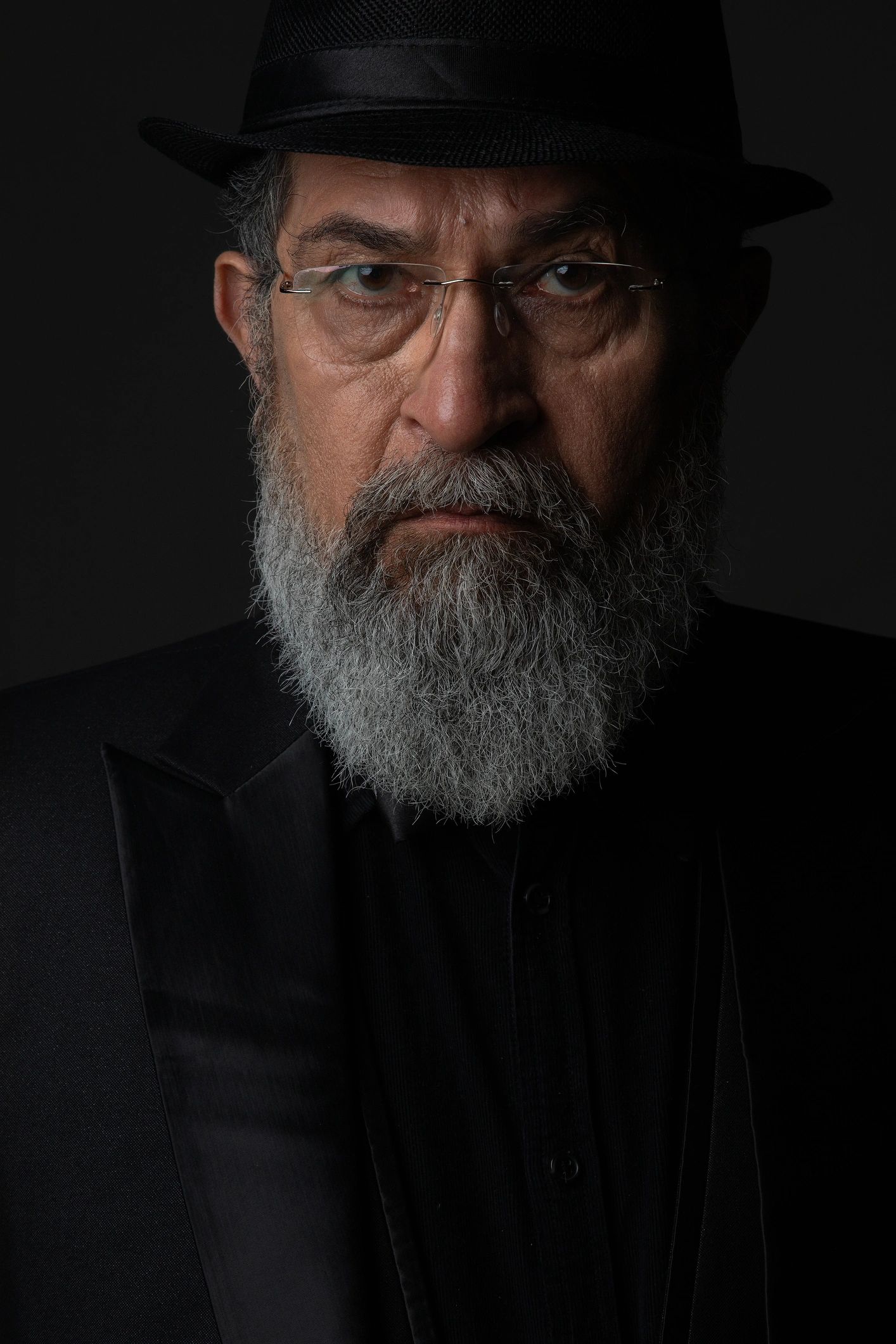 Professional portrait representing compliance advisors